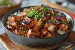 Grilled teriyaki chicken with soy sauce and sesame seeds. closeup photo