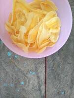 keripik pisang or banana chips is one of type traditional dry snack from indonesia photo