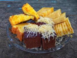 Kue Lapis or Kue Pepe or Rainbow sticky layer cake, Indonesian traditional dessert made from rice flour and coconut milk, steamed layer by layer photo