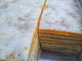 Kue Lapis or Kue Pepe or Rainbow sticky layer cake, Indonesian traditional dessert made from rice flour and coconut milk, steamed layer by layer photo