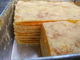 Kue Lapis or Kue Pepe or Rainbow sticky layer cake, Indonesian traditional dessert made from rice flour and coconut milk, steamed layer by layer photo