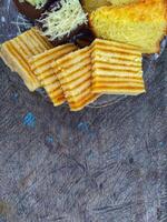 Kue Lapis or Kue Pepe or Rainbow sticky layer cake, Indonesian traditional dessert made from rice flour and coconut milk, steamed layer by layer photo