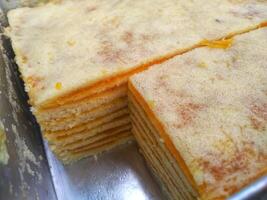 Kue Lapis or Kue Pepe or Rainbow sticky layer cake, Indonesian traditional dessert made from rice flour and coconut milk, steamed layer by layer photo