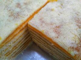 Kue Lapis or Kue Pepe or Rainbow sticky layer cake, Indonesian traditional dessert made from rice flour and coconut milk, steamed layer by layer photo