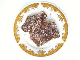 Ongol Ongol, Indonesian Traditional Snacks, made from Arrowroot Flour and Brown Sugar, on white background photo