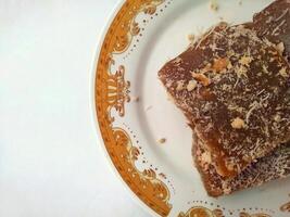 Ongol Ongol, Indonesian Traditional Snacks, made from Arrowroot Flour and Brown Sugar, on white background photo