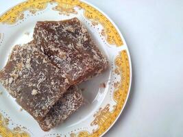 Ongol Ongol, Indonesian Traditional Snacks, made from Arrowroot Flour and Brown Sugar, on white background photo