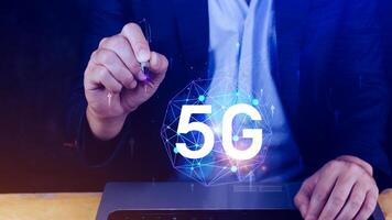 5G network concept, Business using with holographic digital globe with interconnected 5G symbols, 5G technology in modern business and communication, digital transformation. photo