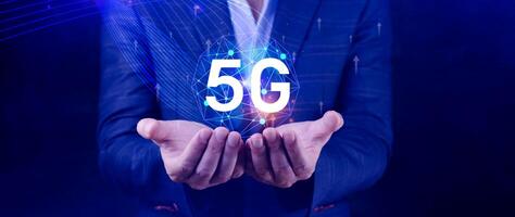 5G network concept, Business using with holographic digital globe with interconnected 5G symbols, 5G technology in modern business and communication, digital transformation. photo