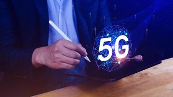 5G network concept, Business using with holographic digital globe with interconnected 5G symbols, 5G technology in modern business and communication, digital transformation. photo