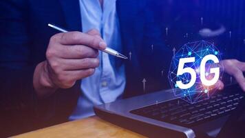 5G network concept, Business using with holographic digital globe with interconnected 5G symbols, 5G technology in modern business and communication, digital transformation. photo