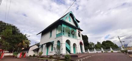 View of around Villa Yuliana Museum is a Dutch heritage building which has been converted into a museum for storing historical objects. Watansoppeng, Soppeng, South Sulawesi, Indonesia - June 29 2024 photo