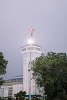 Bogor, Juy 21 2024. The minaret of the Great Mosque of Bogor rises majestically, showcasing intricate architecture and spiritual significance. photo