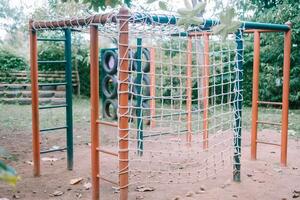 Kids' play area with metal frames and installed rope nets, perfect for climbing adventures. photo
