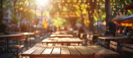 Empty Wooden Picnic Table at a Sunny Outdoor Gathering photo