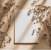 Dried Flower Arrangement With a Blank Card on a Beige Background photo
