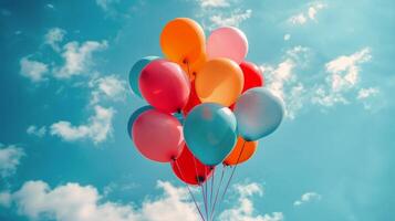 Group of Colorful Balloons Floating in the Air photo