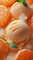 Fruit background with tangerine slices in juice, with ice cream balls, ice cubes and mint leaves. photo