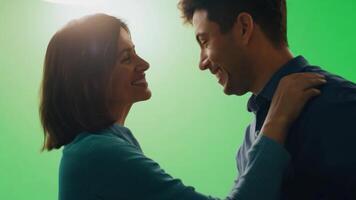 A social worker in casual wear, comforting someone. Green screen backdrop. Warm, soft lighting to create a welcoming atmosphere. video