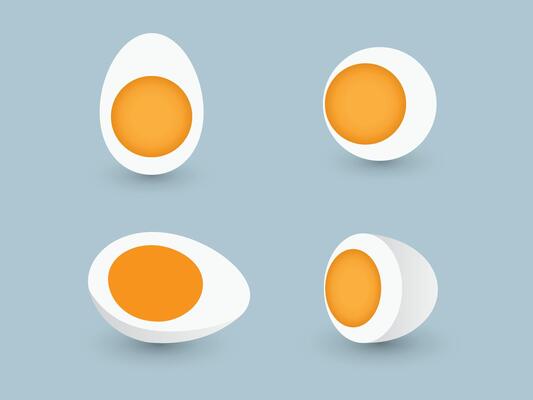 A set of sliced and half chicken eggs with yolk on blue background