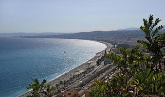 View over the turquoise water and the coastline of Nice, France photo