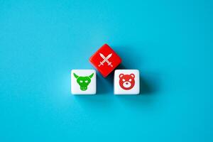 The struggle between bulls and bears on the stock exchange. Strategy on the stock exchange. Stocks, futures, currencies and cryptocurrency. photo