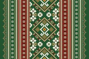 Geometric ethnic design pattern on green background,floral cross stitch vector