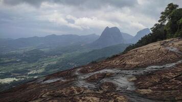 a view of the mountains and valleys from a mountain top photo