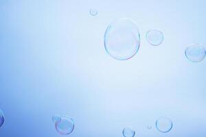 Large multicolored soap bubbles flying in the cloudy sky. Big bubble outdoors in the spring or summer street. Many bubbles isolated on white background. Simple creative concept. Close-up. Copy space photo