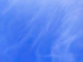 blue sky background with tiny clouds, soft focus, nature abstract background photo