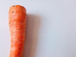 Carrots source of vitamin A isolate on white photo