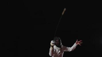 Fighting Fencer With Foil Or Epee Moving In Darkness, Slow Motion, Attack And Defense In Fencing video