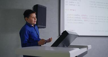 Genius Schoolboy Speaking In Classroom, Presenting Program Code In Programming Classes video