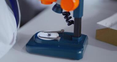 Microscope With Dried Beetle In Biology Class, Closeup View, Student Girl Viewing Bug In Macro video