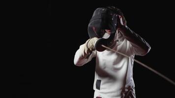 Tired Fencer Putting On Fencing Mask On Face And Keep Training, Motivation Of Professional Sportsman video