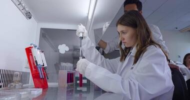 Educational Experiment In Class, Teacher Teaching Student Girl To Mixing Reagents, Future Scientist video