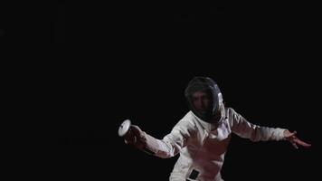 Figure Of Professional Swordsman In Darkness, Moving And Fighting, Practicing Attack video
