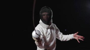 Portrait Of Aggressive Fencer With Foil In Hand, Man In Fencing Helmet Looking At Camera, Attacking video