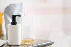Refill to reduce plastic waste. soap or shampoo for refill. plastic bottles for refill liquid soap, shampoo and other products. Zero waste. Reuse reduce recycle concept. photo