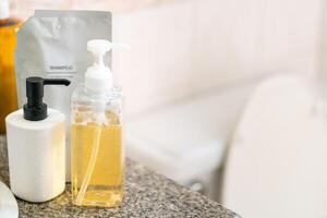 Refill to reduce plastic waste. soap or shampoo for refill. plastic bottles for refill liquid soap, shampoo and other products. Zero waste. Reuse reduce recycle concept. photo