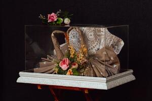 Wedding gift box given by the groom to the bride in Indonesian culture which contains various kinds of daily necessities that are decorated beautifully and attractively photo