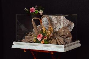 Wedding gift box given by the groom to the bride in Indonesian culture which contains various kinds of daily necessities that are decorated beautifully and attractively photo