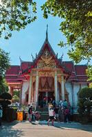 Phuket, Thailand, 2024 - The magnificent Wat Chalong Buddhist temple was built in the 19th century, apart from being a house of worship it is also a popular tourist destination in Phuket. photo