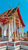 Phuket, Thailand, 2024 - The magnificent Wat Chalong Buddhist temple was built in the 19th century, apart from being a house of worship it is also a popular tourist destination in Phuket. photo