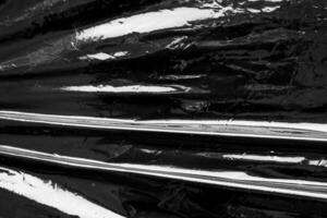 Black transparent plastic film wrap overlay texture background photo