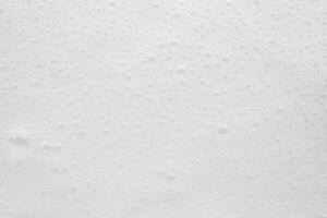 Abstract white soap foam bubbles texture background photo