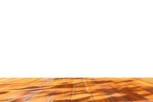 Empty wooden table top isolated on white background for montage product display photo