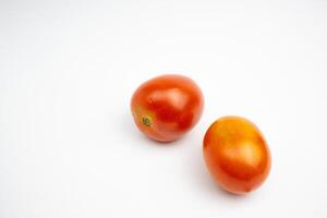 Fresh red tomatoes. in Groups. isolated on white background. photo