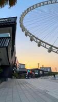 The Ain Dubai, world's tallest Ferris wheel, opens in Dubai The Ain Dubai takes more than half hour for one complete rotation. It stands at more than 800 feet tall. High quality 4k footage video