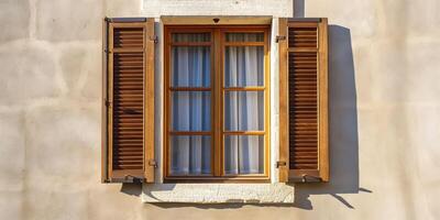Rustic wooden window with open shutters on a textured wall, bathed in sunlight, showing Victorian architectural style, rustic architecture concept photo